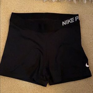 Size medium black nike pros!
